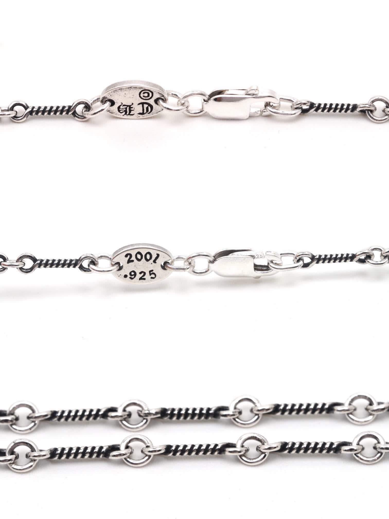 Chrome Hearts Silver Cross Pendant with Black Stones